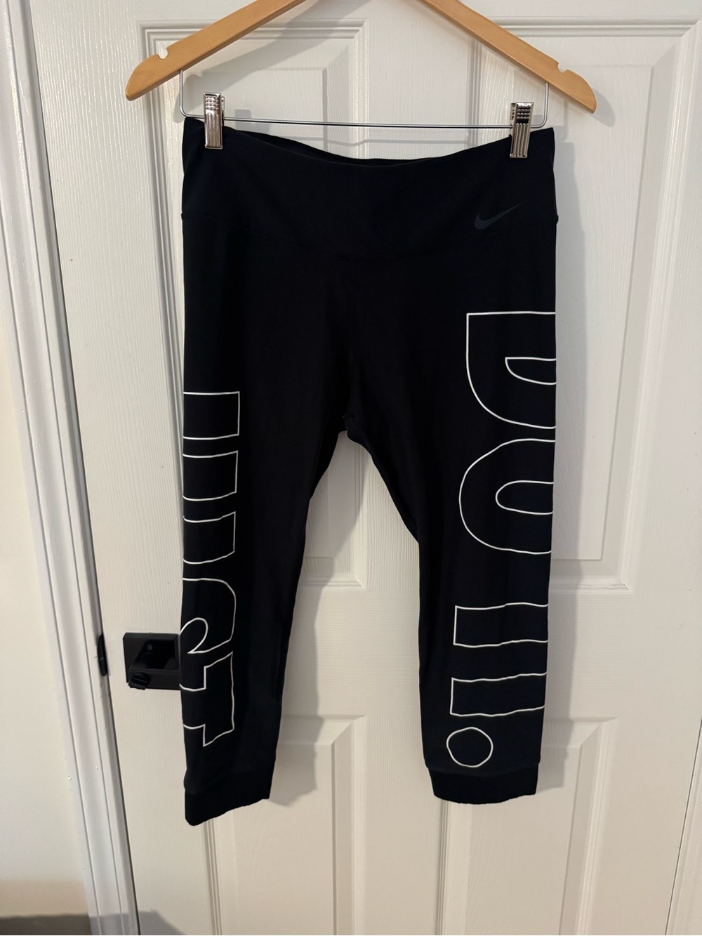 Nike Black Capri Leggings with White 'JUST DO IT' Side Graphics
